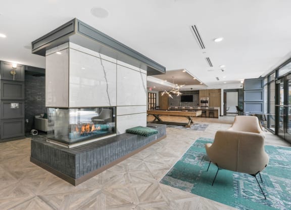 Trellis House apartments social lounge with fireplace