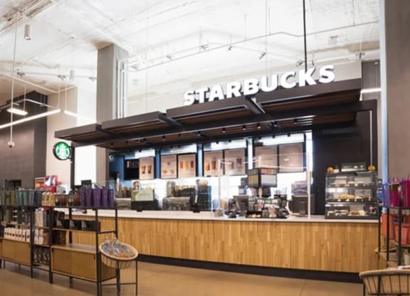 a Starbucks store near The Gabriella apartments