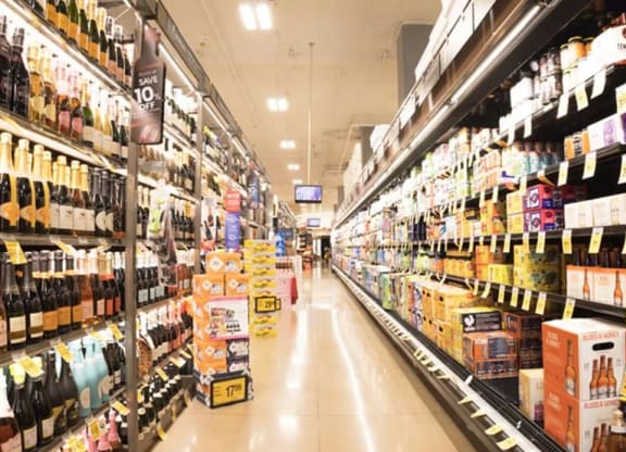 a supermarket aisle at a grocery store near The Gabriella apartments
