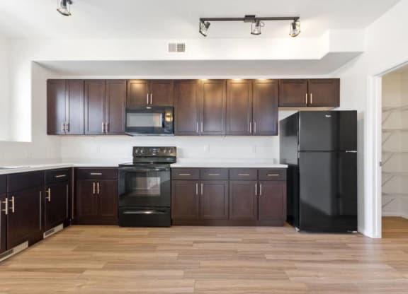 Wood Floor Living Room at Belle Creek Commons, Henderson, Colorado