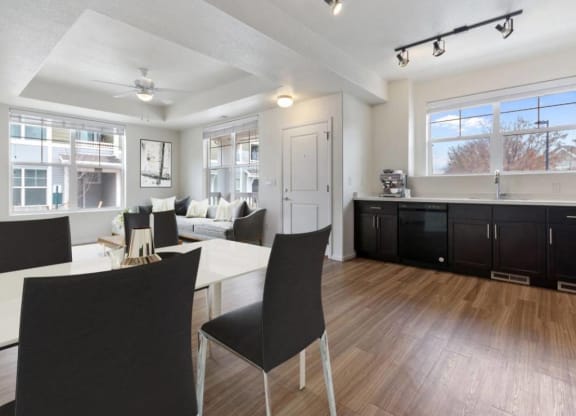 Dining Area With Living Room View at Belle Creek Commons, Henderson, 80640