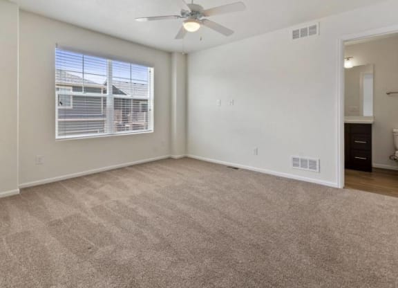 Ceiling Fan In Bedroom at Belle Creek Commons, Henderson, CO, 80640