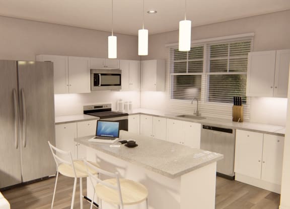 Modern kitchen with refrigerator and cabinets at Brownstones at Palisade Park, Broomfield, 80023