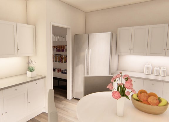 kitchen with white cabinetry at Brownstones at Palisade Park, CO, 80023