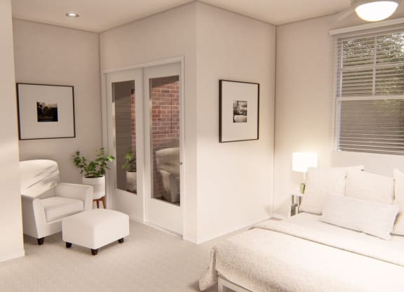 Luxurious bedroom with a comfortable chair at Brownstones at Palisade Park, Broomfield, 80023