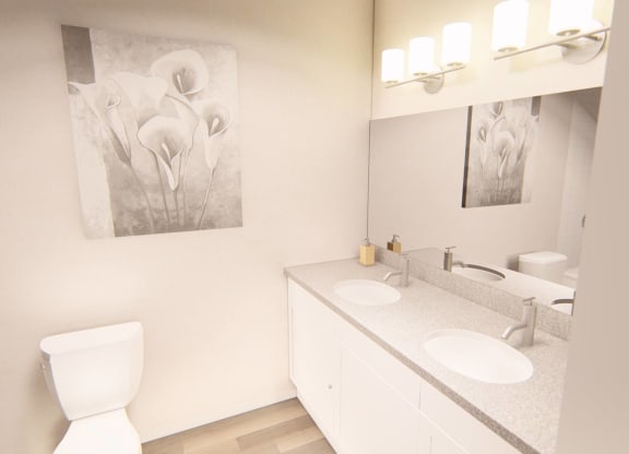 bathroom with two sinks at Brownstones at Palisade Park, CO, 80023