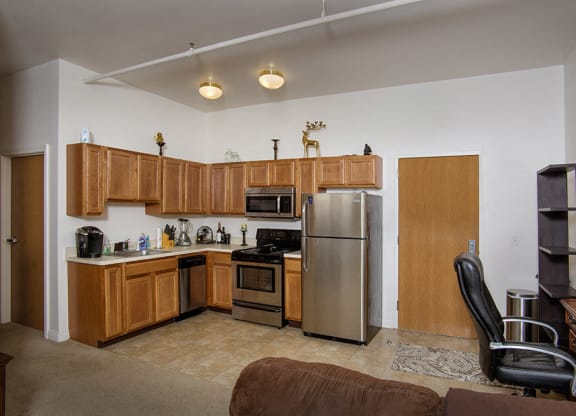 Spacious kitchen with appliances at the Lofts at 5 Lyon, in downtown Grand Rapids, MI