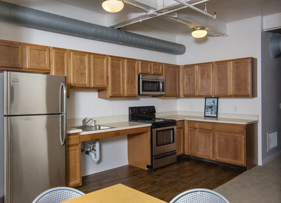 Spacious kitchen with appliances at the Lofts at 5 Lyon, in downtown Grand Rapids, MI