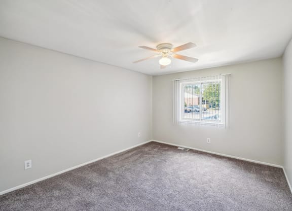 Spacious bedroom with natural light | One Bedroom Apartments in Southfield, MI