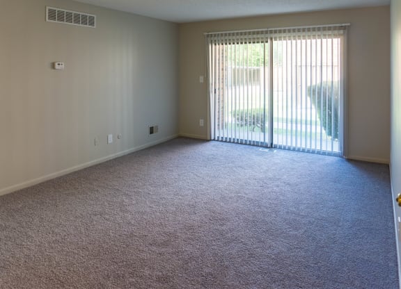 Spacious living space at Carriage House Apartments in Flint, Michigan
