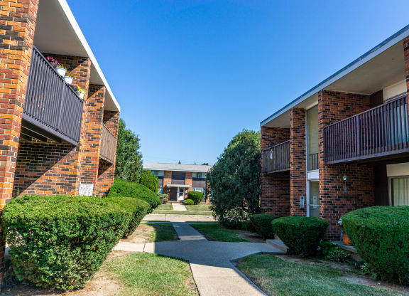 Sidewalks and building exteriors at Carriage House Apartments in Flint, Michigan