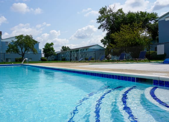 Swimming Pool entry with Pool chairs, at Gale Gardens Apartments
