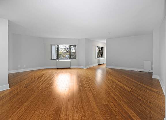 A large living room with wooden floors in Kalamazoo, MI.
