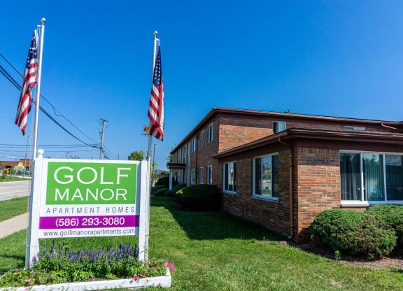 Entrance and exterior apartments at Golf Manor Apartments in Roseville, Michigan