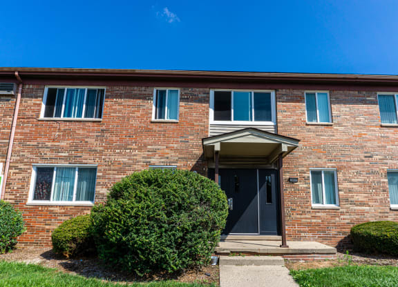 Apartment building entrance at Golf Manor Apartments in Roseville, Michigan