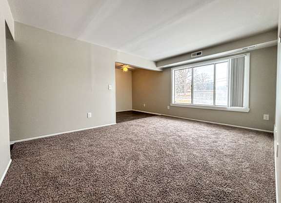 Apartments with Patio and large living room in Warren, MI