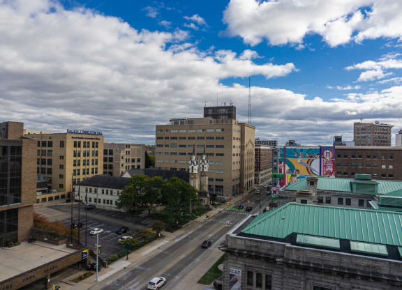 a view of the city from a bedroom in the Lofts at 5 Lyon in Grand Rapids, MI