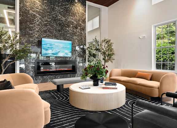 Living room with a Television at Chestnut Hill Village Apartments, Philadelphia, Pennsylvania