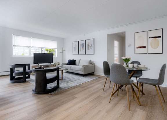 Living and dining room with hardwood floors at Chestnut Hill Village Apartments, Philadelphia, PA