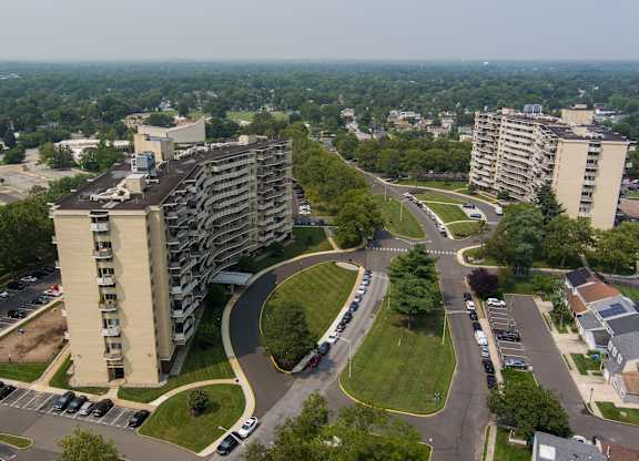 A large building with a parking lot in front of it at Premier at Cherry Hill, Cherry Hill, NJ 08002