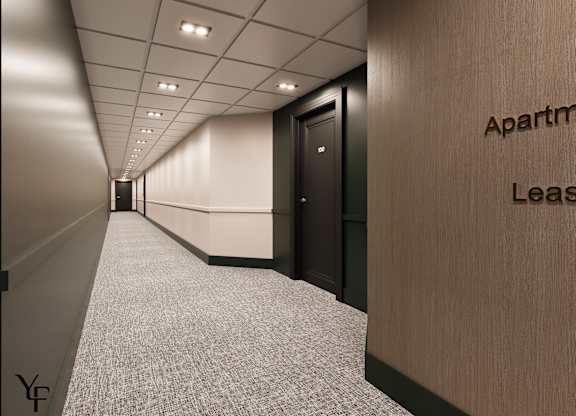 A long hallway with a sign that says Apartment Lease.