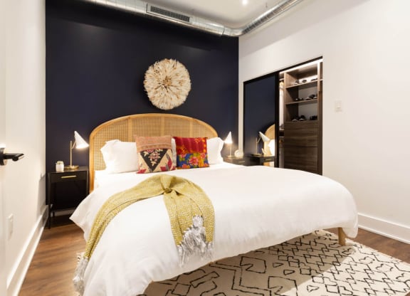 a bedroom with a bed and a rainbow colored wall at The Irvine, Philadelphia, Pennsylvania