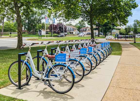 A row of bicycles are parked in a bike rack at Premier at Cherry Hill, Cherry Hill