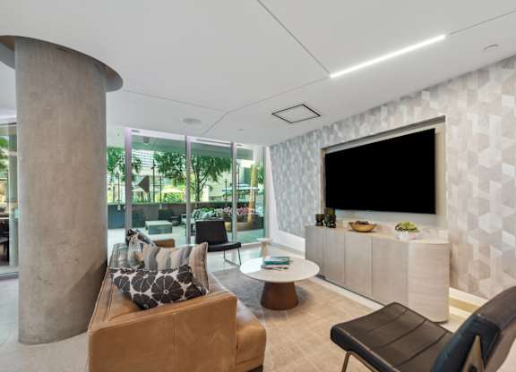 Living room with a TV at K1 Apartments, California, 92101