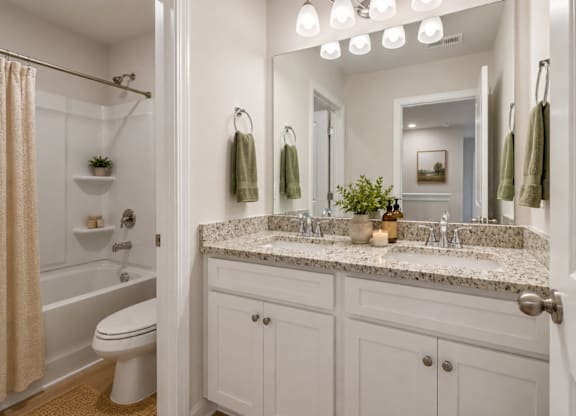 Secondary suite bathroom with a tub and shower combination