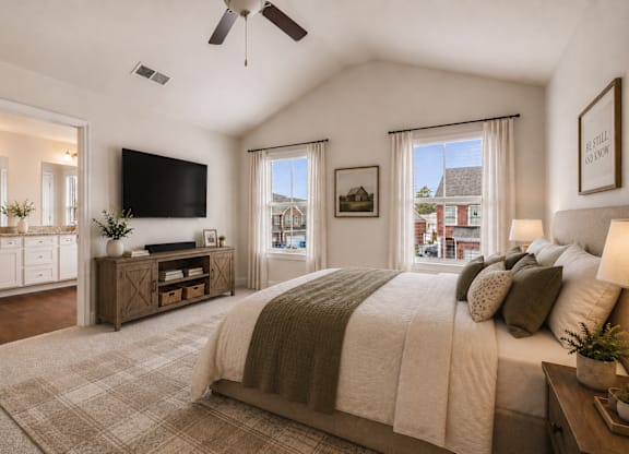 Serene primary suite with a plush king bed, refined finishes, and calming greenery—your private retreat for rest and relaxation.