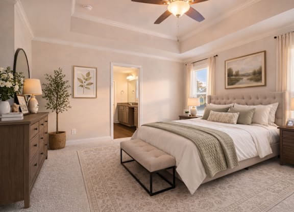 Serene primary suite with a plush king bed, refined finishes, and calming greenery—your private retreat for rest and relaxation.