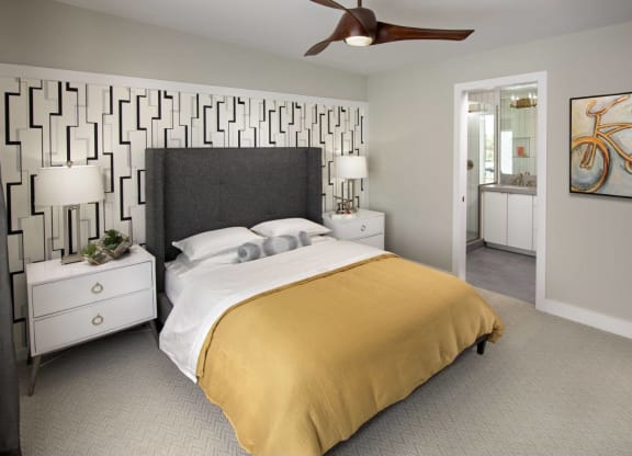 a bedroom with a bed and a ceiling fan at Novella Arcadia, Phoenix, 85018