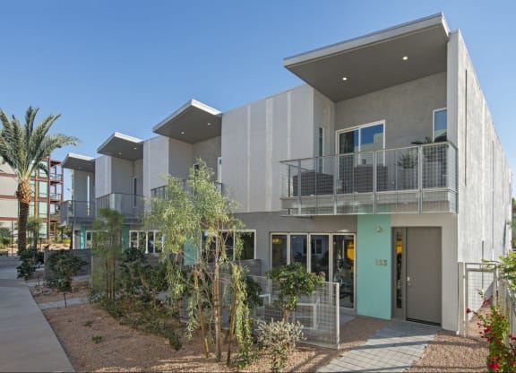 a building with a balcony and a blue sky at Novella Arcadia, Phoenix, AZ 85018