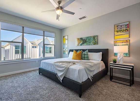 Comfortable Bedroom With Large Window at Villae ATX Luxury Rental Townhomes, Manchaca, TX, Texas