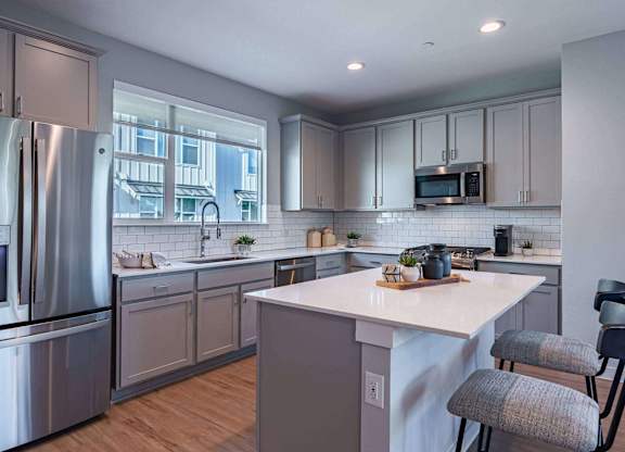 Modern Kitchen With Stainless Steel Appliances And Double Door Refrigerators at Villae ATX Luxury Rental Townhomes, Manchaca, TX, Texas, 78652