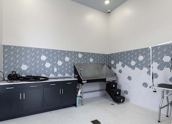 a kitchen with a stove and a sink