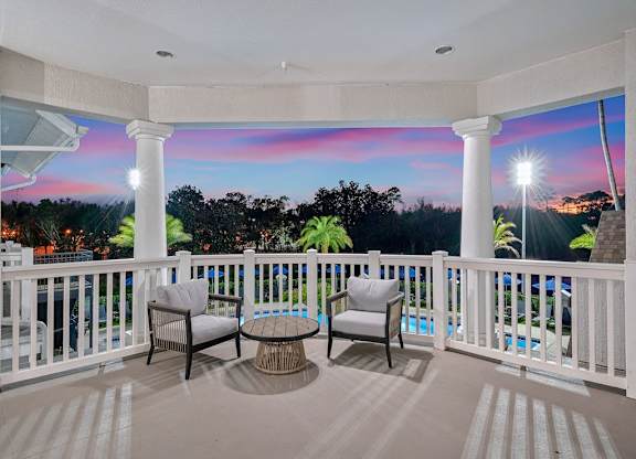 Private patio overlooking the resort style swimming pool