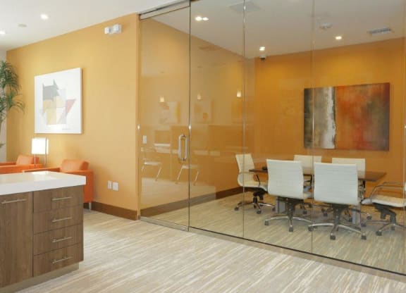 a bathroom with a large mirror and a sink