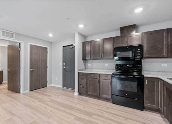 open concept kitchen and unit entryway