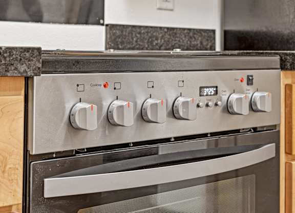 A stainless steel oven with a digital display showing 325 degrees.