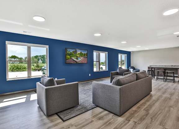 Community room with a variety of seating options.