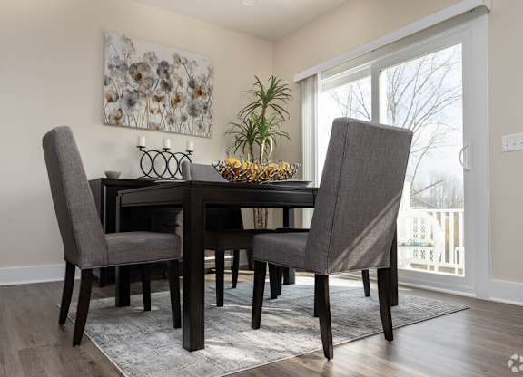 Dining room with table at Hathaway Meadows, Farmington, 14425