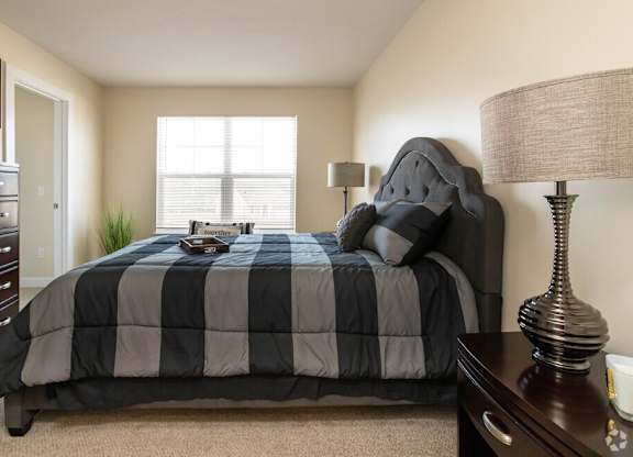 Bedroom with cozy bed at Hathaway Meadows, Farmington, NY, 14425