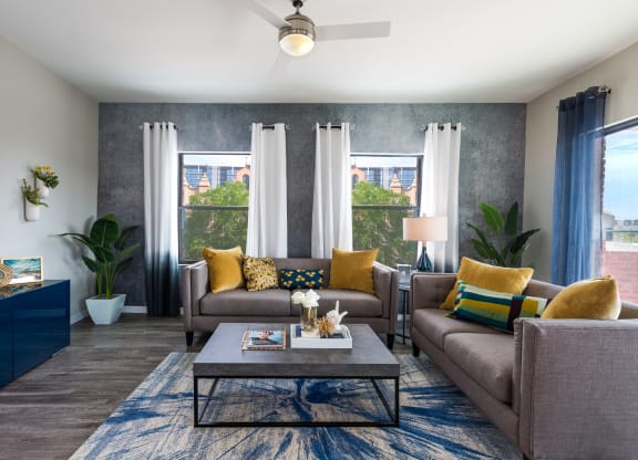 Ample Natural Lighting And Large Windows In Living Rooms At Union at Roosevelt Apartments In Phoenix, AZ