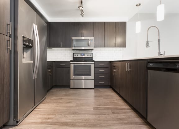 Plank Flooring In Apartment Kitchens At Union at Roosevelt Apartments In Phoenix, AZ