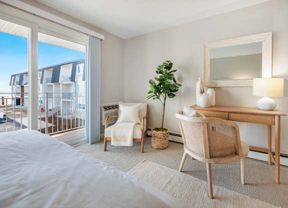 Bedroom with a bed and a dresser at 151 Ocean Road LLC, Narragansett, RI, Rhode , 02882