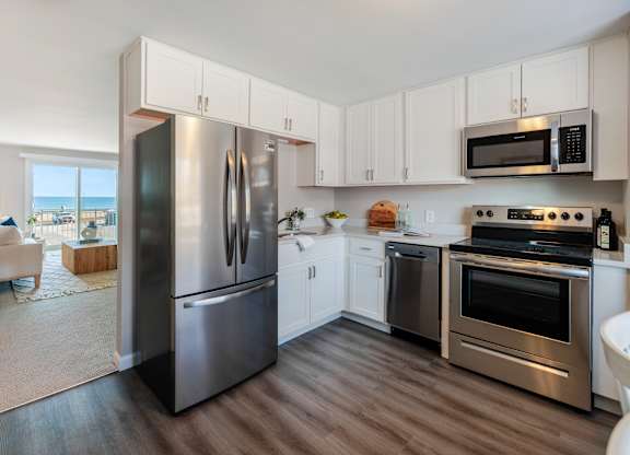 Modern Kitchen With Stainless Steel Appliances And Double Door Refrigerators at 151 Ocean Road LLC, Narragansett, Rhode