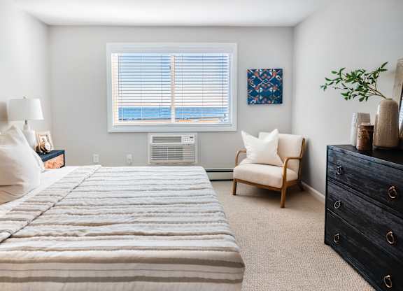Bedroom With Expansive Windows at 151 Ocean Road LLC, Narragansett