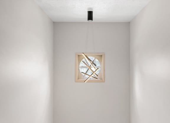 a clock hanging on a wall in a room