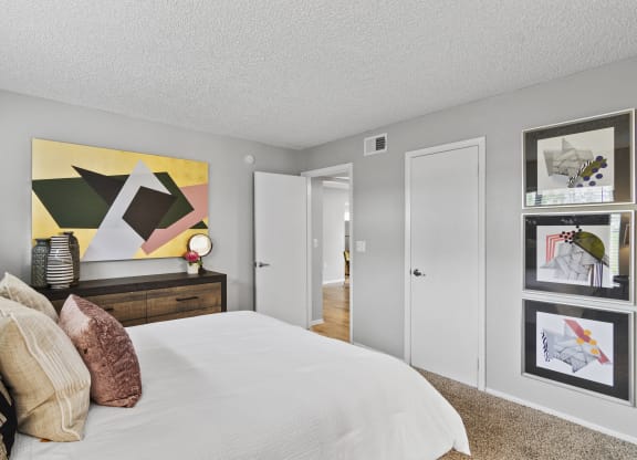 our apartments offer a bedroom with a bed and a closet